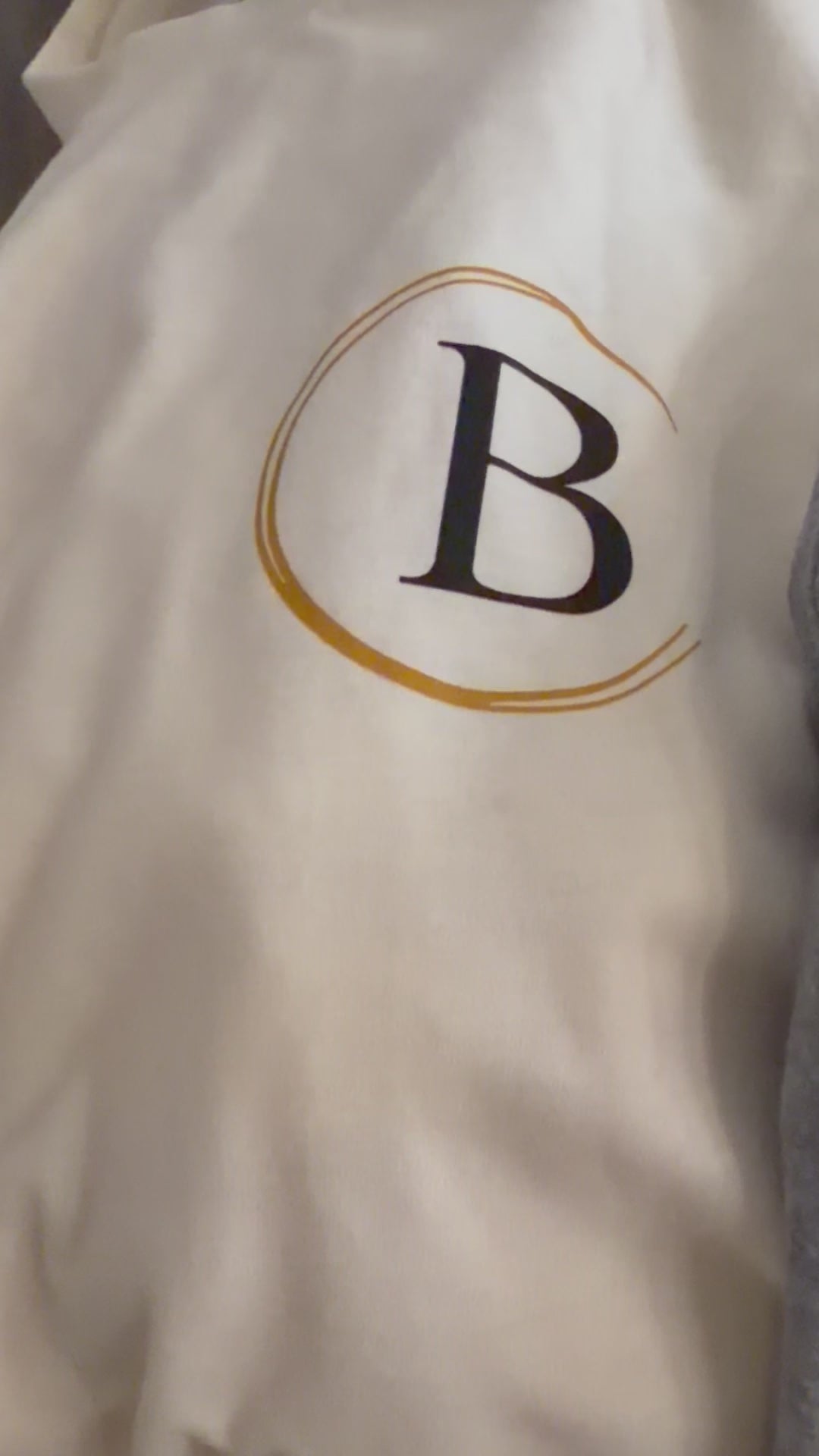 Load video: Blessings Threads was born from a simple belief: fashion should stand for something greater. As a single parent myself, I witnessed firsthand the struggles mothers face—choosing between rent and groceries, working multiple jobs just to keep the lights on, sacrificing their own needs for their children's future. I wanted to create something different. A brand that didn't just talk about giving back but made it the foundation of everything we do. Every month, we select one single mother and dedicate a portion of our proceeds to help transform her life. But we refused to compromise on quality. These aren't charity tees—they're premium essentials crafted with the same attention to detail as luxury streetwear. Because doing good should never mean settling for less. Today, Blessings Threads is more than a clothing brand. It's a movement of people who believe that what you wear can change lives. Every hoodie. Every tee. Every purchase is a vote for a world where fashion has purpose. Join us in redefining what fashion can do.